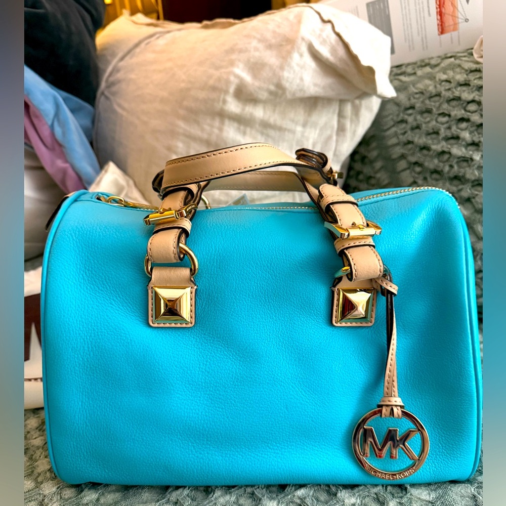 Brand new Michael Kors leather purse, color aquamarine.